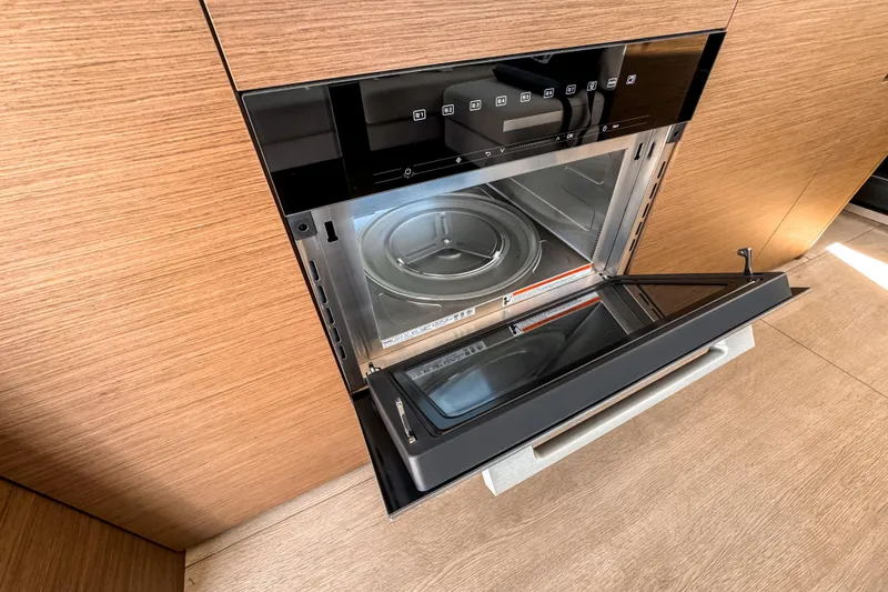 Slide: The Image of Built-in microwave oven in 2026 Wellcraft 44 Explorer yacht kitchen. - 17