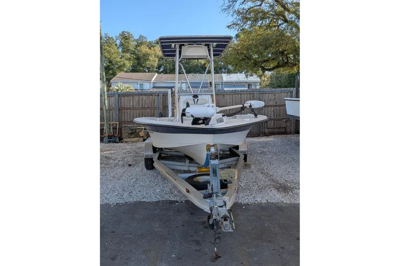 Slide: The Image of 2005 Ranger 2180 Bay Ranger boat on trailer, parked outdoors. - 3