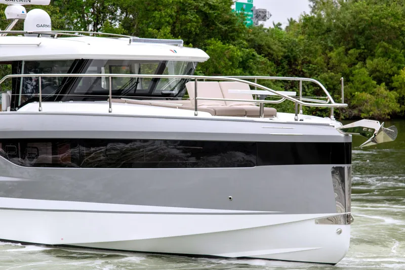 Slide: The Image of Wellcraft 44 Explorer 2026 on calm waters, modern design. - 45