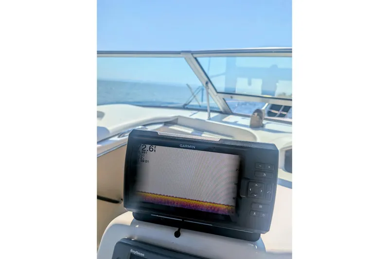 Slide: The Image of Garmin navigation system on 1998 Sea Ray Sundancer 330 boat, ocean view in background. - 5