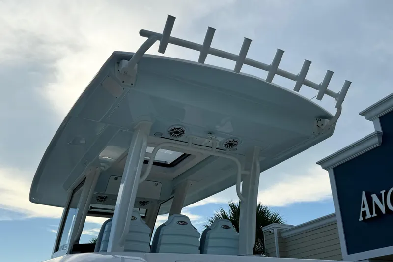 Slide: The Image of 2025 Robalo R360 Center Console boat with sleek design and modern features. - 5