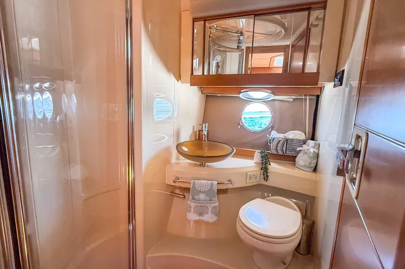 Slide: The Image of Luxurious bathroom interior of 2013 Azimut 45 yacht with modern fixtures and porthole view. - 7