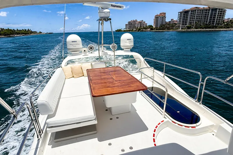 Slide: The Image of Luxurious 2013 Azimut 45 yacht cruising on blue waters with scenic coastal view. - 8