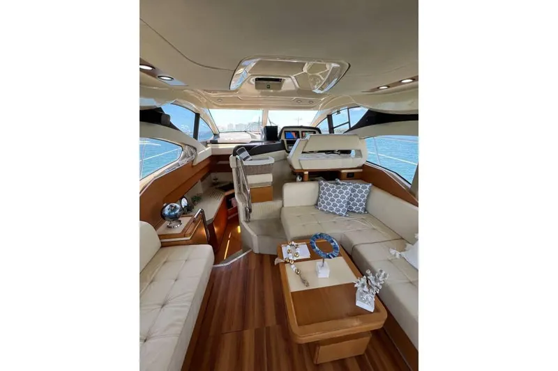 Slide: The Image of Luxurious interior of a 2013 Azimut 45 yacht with elegant seating and decor. - 9
