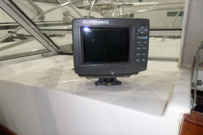 Slide: The Image of Lowrance marine GPS device on 1980 Lyman-Morse Fisherman Sleeper boat dashboard. - 18
