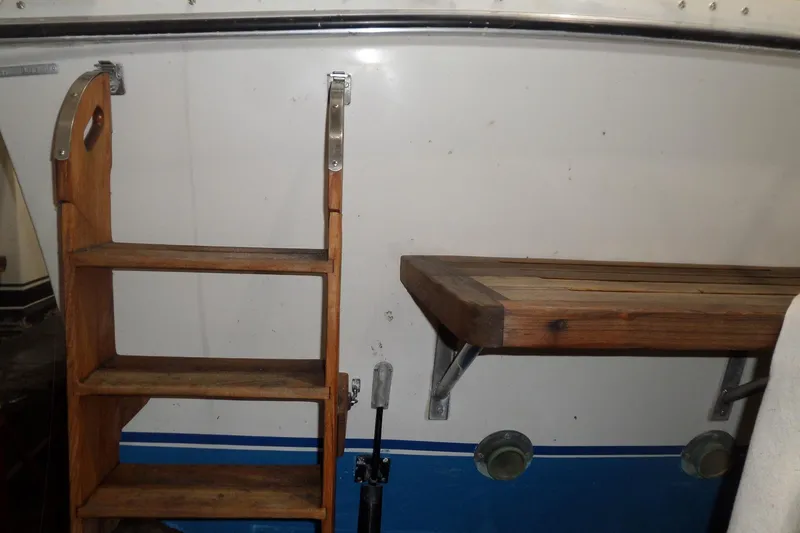 Slide: The Image of Wooden ladder and bench on 1980 Lyman-Morse Fisherman Sleeper boat. - 5