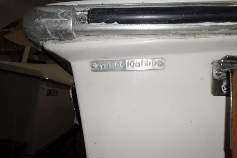 Slide: The Image of 1980 Lyman-Morse Fisherman Sleeper boat with visible identification plate. - 6