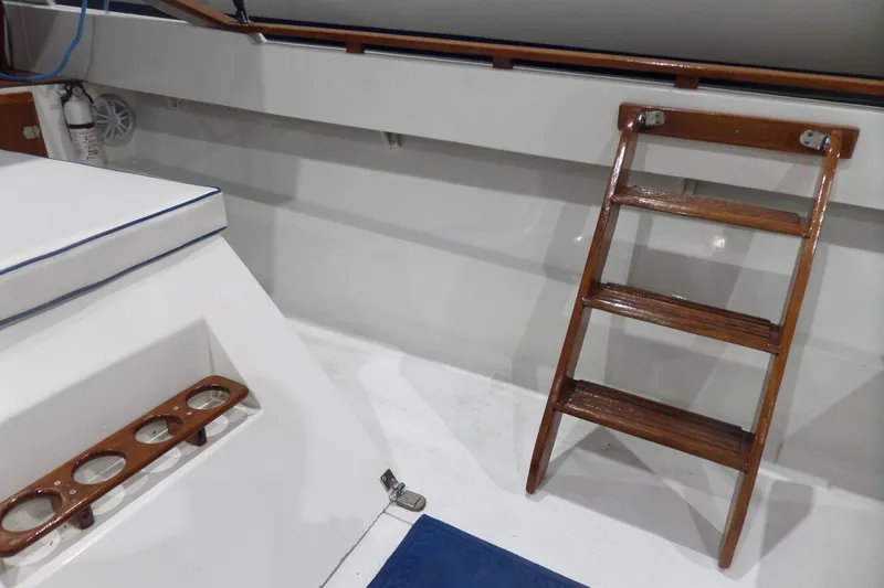 Slide: The Image of Interior of 1980 Lyman-Morse Fisherman Sleeper boat with wooden ladder and seating. - 9