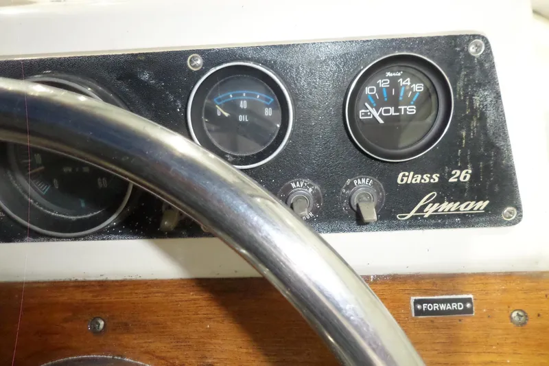 Slide: The Image of 1980 Lyman-Morse Fisherman Sleeper dashboard with gauges and steering wheel. - 22