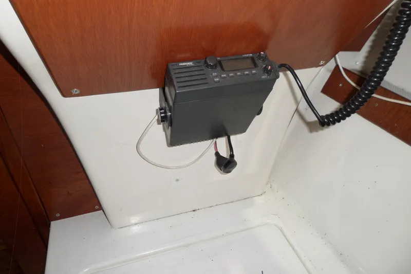 Slide: The Image of 1980 Lyman-Morse Fisherman Sleeper boat interior with mounted radio equipment. - 25