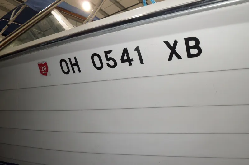 Slide: The Image of 1980 Lyman-Morse Fisherman Sleeper boat with registration OH 0541 XB in a storage facility. - 3