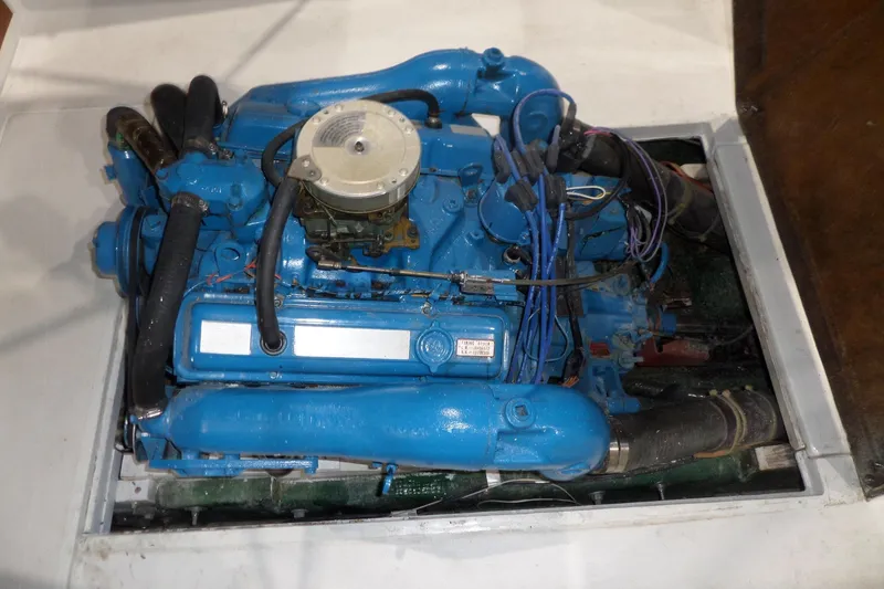 Slide: The Image of Blue engine of a 1980 Lyman-Morse Fisherman Sleeper boat, detailed view. - 32