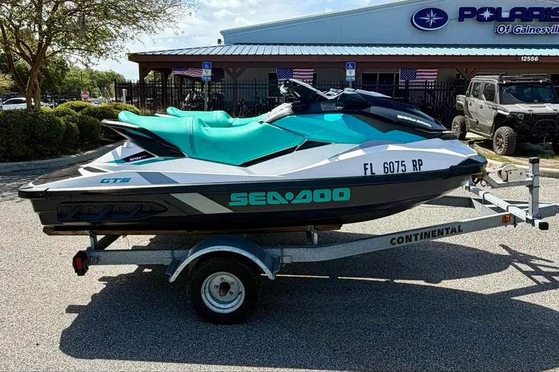 Slide: The Image of 2018 Sea-Doo GTS jet ski on trailer outside dealership. - 4
