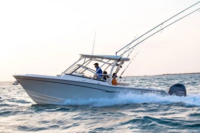 The Image of Manufacturer Provided Image: 2019 Grady-White Freedom 275 boat cruising on the ocean. - 0
