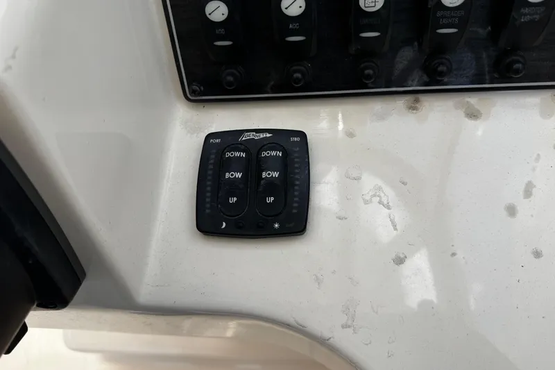 Slide: The Image of Control panel on a 2019 Grady-White Freedom 275 boat dashboard. - 15