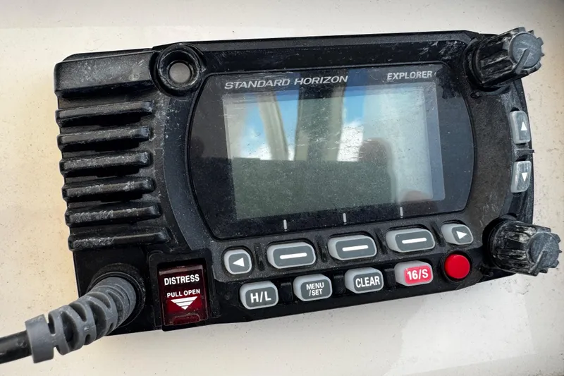 Slide: The Image of Standard Horizon Explorer marine radio on 2019 Grady-White Freedom 275 boat. - 18