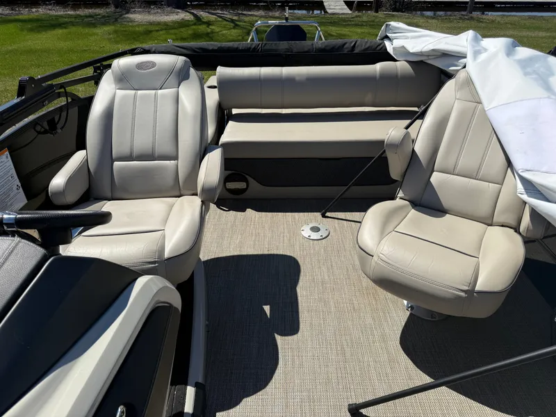 Slide: The Image of Interior of a 2019 Barletta Lusso 23UC with beige leather seats. - 4