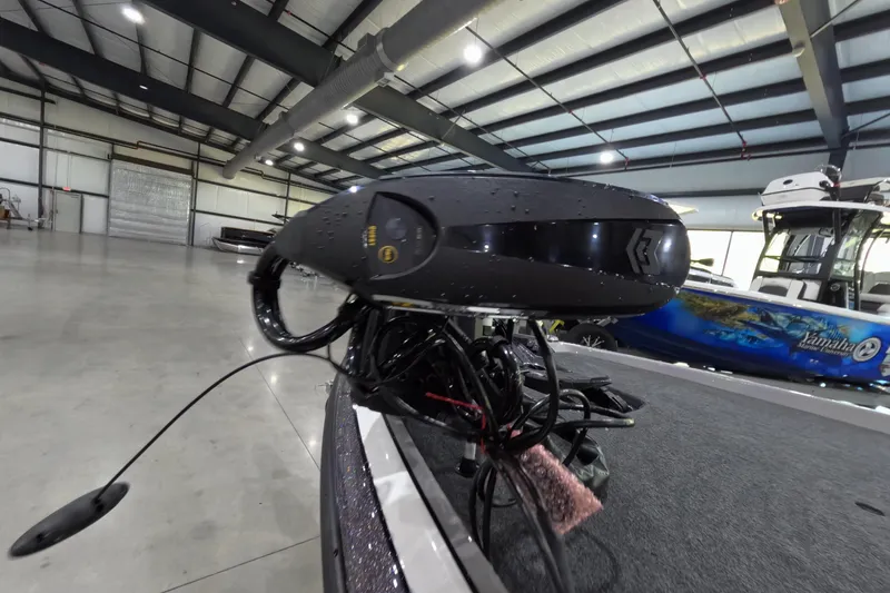 Slide: The Image of 2026 Skeeter boat in a spacious indoor showroom, featuring advanced equipment. - 6