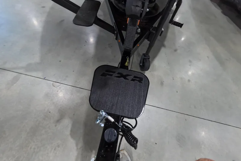 Slide: The Image of 2026 Skeeter FXR boat trailer hitch on concrete floor. - 7