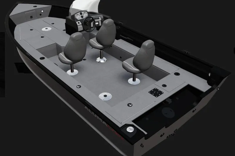 Slide: The Image of 2026 Alumacraft Voyageur 175 SC boat interior with three seats and steering console. - 21