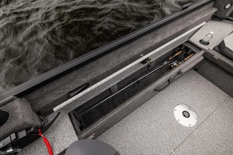 Slide: The Image of 2026 Alumacraft Voyageur 175 SC boat with Mercury engine on trailer. - 3