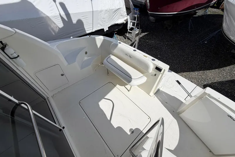 Slide: The Image of 2007 Sea Ray 36 Sedan Bridge boat deck with seating and storage compartments. - 12