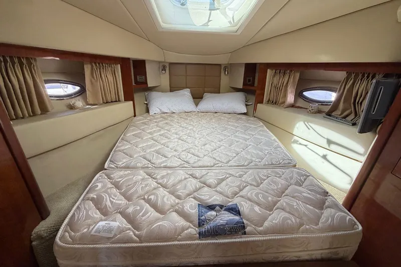 Slide: The Image of Luxurious bedroom interior of 2007 Sea Ray 36 Sedan Bridge yacht with skylight. - 27