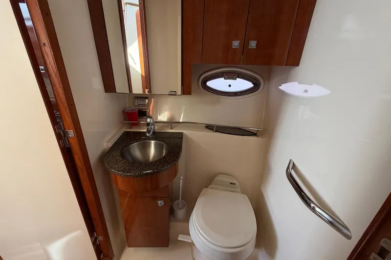Slide: The Image of Luxurious bathroom in 2007 Sea Ray 36 Sedan Bridge yacht with modern fixtures. - 31