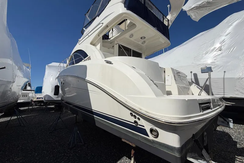 Slide: The Image of 2007 Sea Ray 36 Sedan Bridge yacht on stands, viewed from the rear. - 4