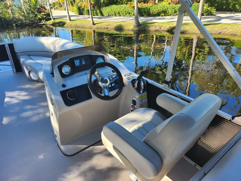 Slide: The Image of Interior view of a 2020 Cypress Cay Seabreeze 232 pontoon boat. - 6