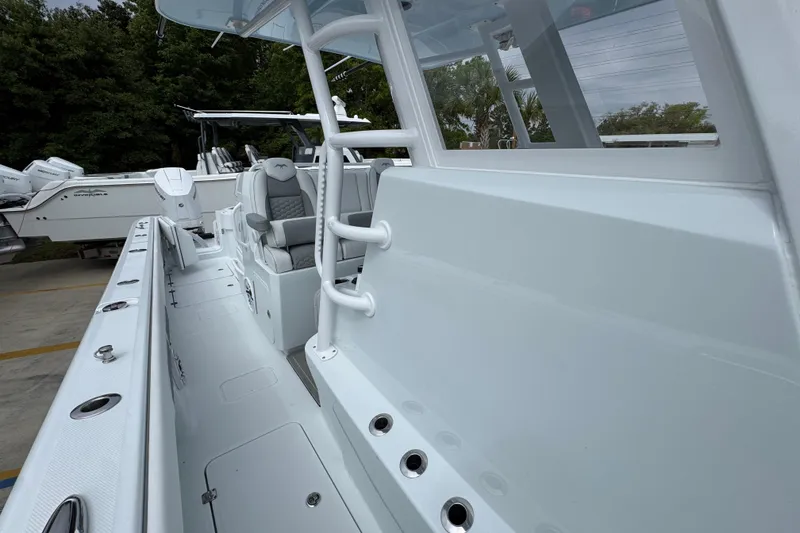 Slide: The Image of 2026 Invincible 33 Catamaran interior with sleek design and modern seating. - 24