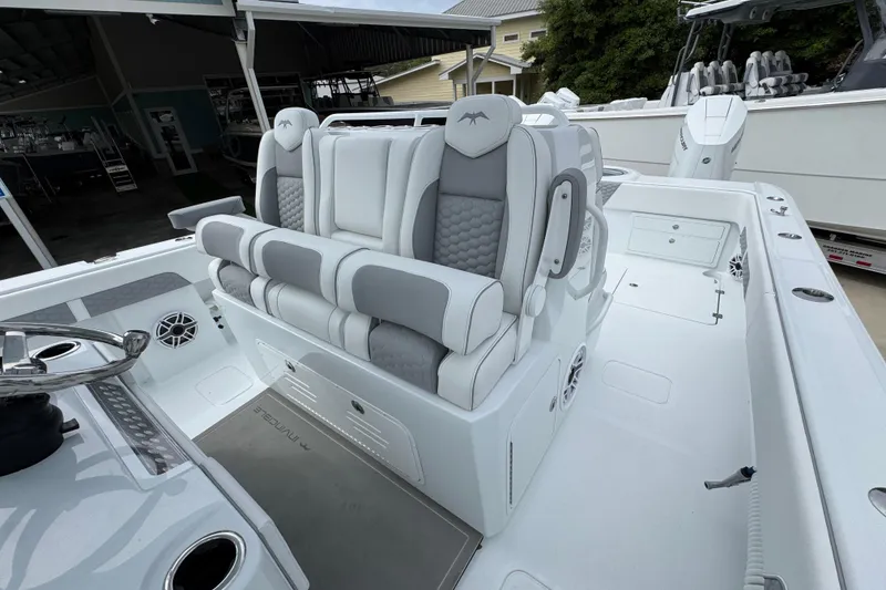 Slide: The Image of 2026 Invincible 33 Catamaran interior with luxurious seating and modern design. - 27