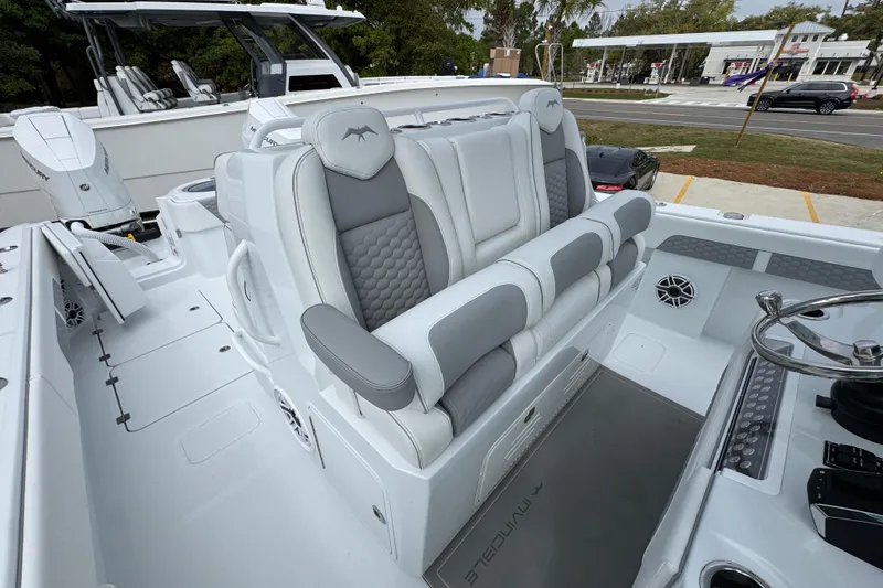 Slide: The Image of 2026 Invincible 33 Catamaran interior with luxurious seating and modern design. - 30