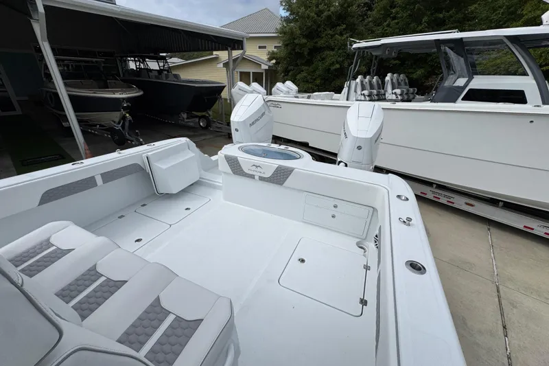 Slide: The Image of 2026 Invincible 33 Catamaran with sleek design, spacious deck, and modern features. - 38