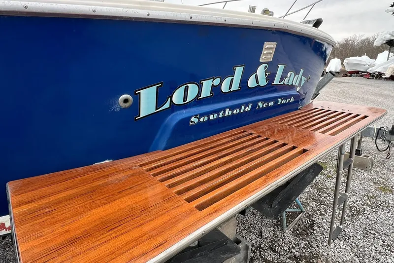 Slide: The Image of 1970 Bertram 25 Moppie boat with wooden swim platform, named "Lord & Lady," Southold, New York. - 15