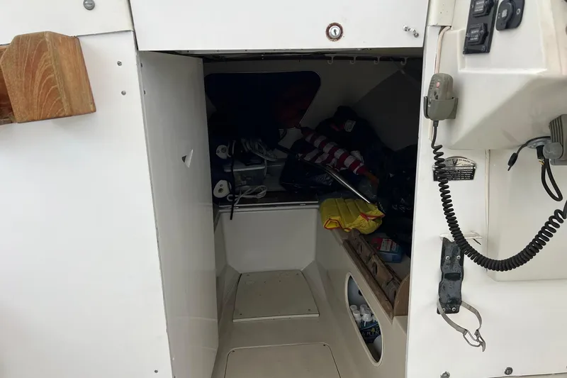 Slide: The Image of Interior cabin of a 1970 Bertram 25 Moppie boat, showing storage and equipment. - 30