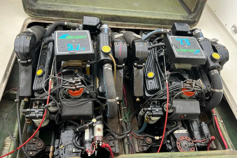 Slide: The Image of Twin Sea Maxx engines in a 1970 Bertram 25 Moppie boat. - 36