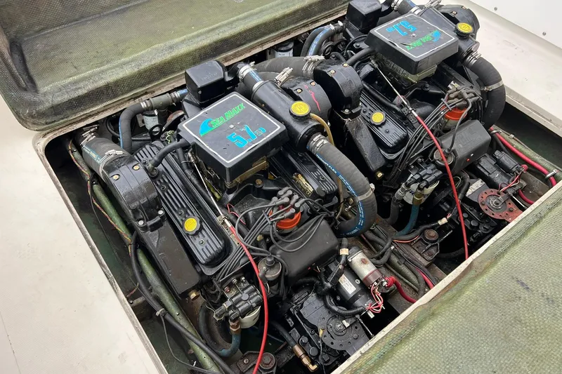 Slide: The Image of Twin Sea Maxx engines in a 1970 Bertram 25 Moppie boat, detailed view. - 37