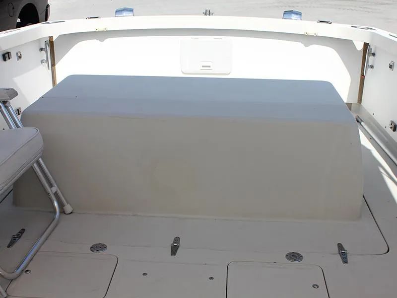 Slide: The Image of Interior of a 1970 Bertram 25 Moppie boat, seating area and storage. - 4