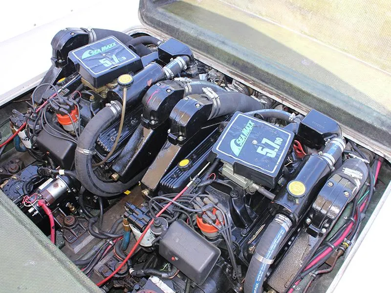 Slide: The Image of Engine compartment of a 1970 Bertram 25 Moppie with dual 5.7L engines. - 5