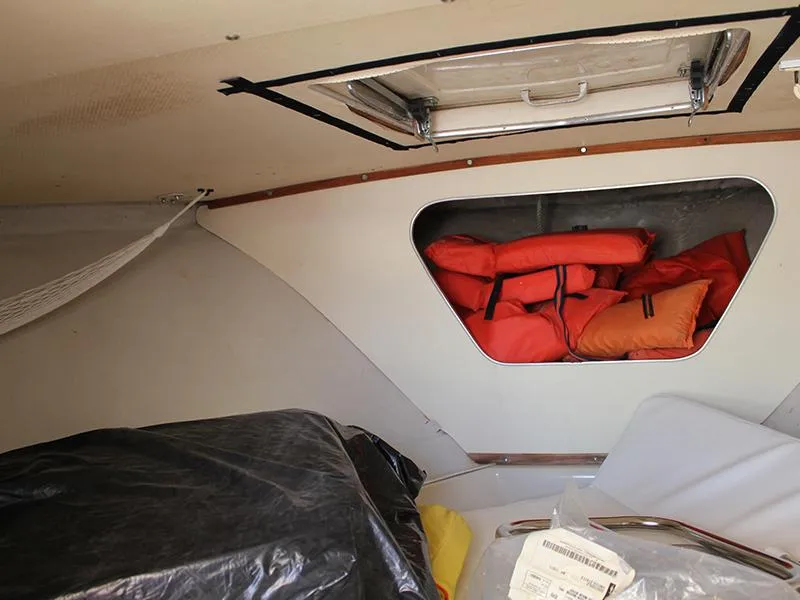 Slide: The Image of Interior of a 1970 Bertram 25 Moppie with life jackets. - 7