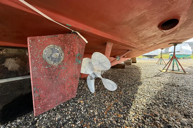 Slide: The Image of Underwater view of 1996 Legacy Yachts 40 propeller and rudder on gravel. - 34