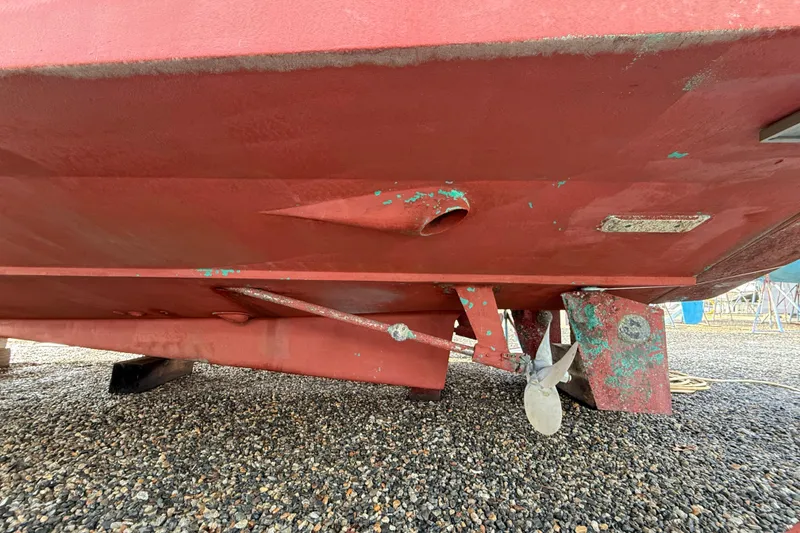 Slide: The Image of Underside of 1996 Legacy Yachts 40 showing propeller and hull condition. - 31