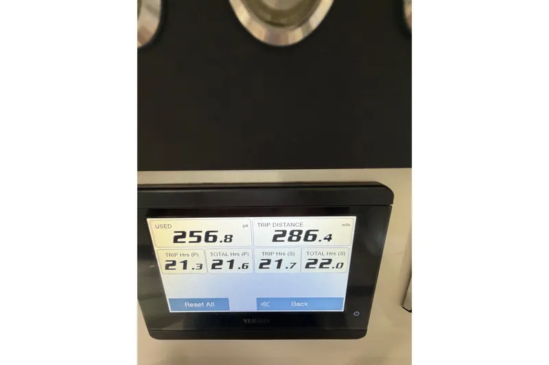 Slide: The Image of Yamaha display showing fuel usage and trip distance on 2023 Regulator 31 boat. - 15