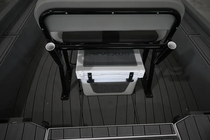 Slide: The Image of 2026 Vexus ACX 2210 boat interior with seating and cooler storage. - 14