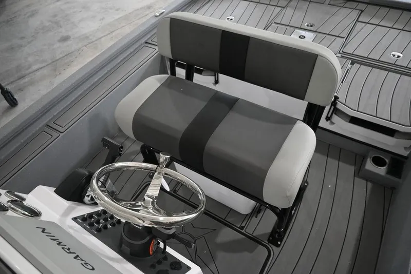 Slide: The Image of Interior of 2026 Vexus ACX 2210 boat with steering wheel and seating. - 15