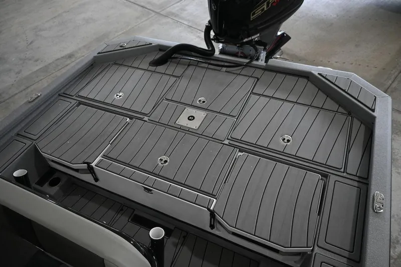 Slide: The Image of 2026 Vexus ACX 2210 boat deck with sleek, modern design and storage compartments. - 8