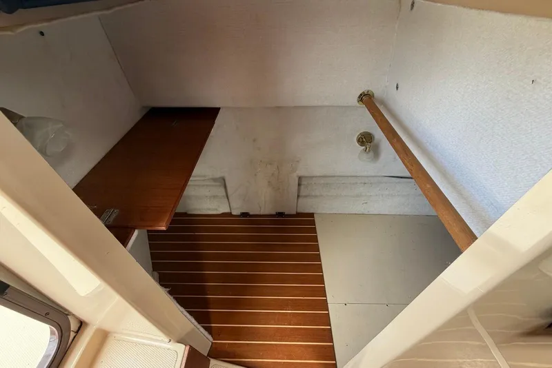 Slide: The Image of Interior view of 2014 Ranger Tugs R-27 with windows and curtains. - 27