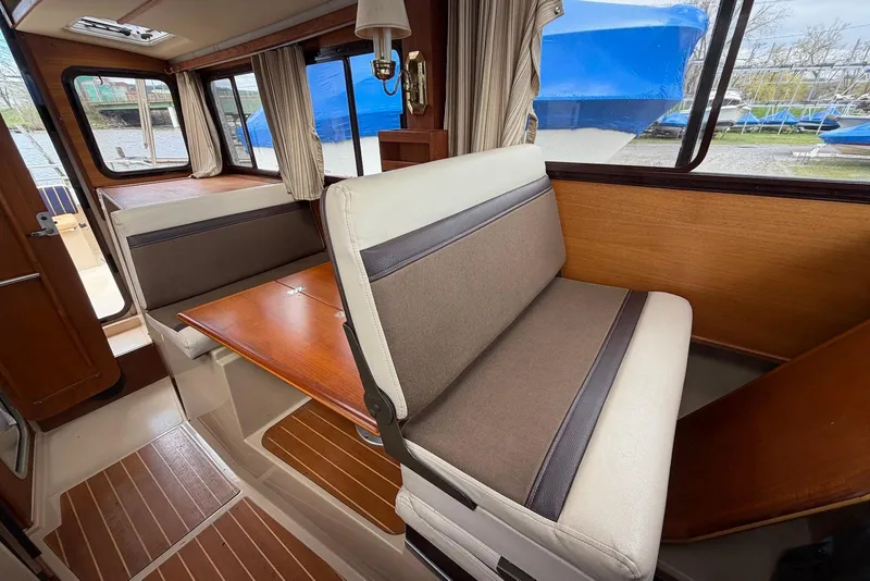 Slide: The Image of Engine compartment of a 2014 Ranger Tugs R-27 with Volvo Penta engine. - 39