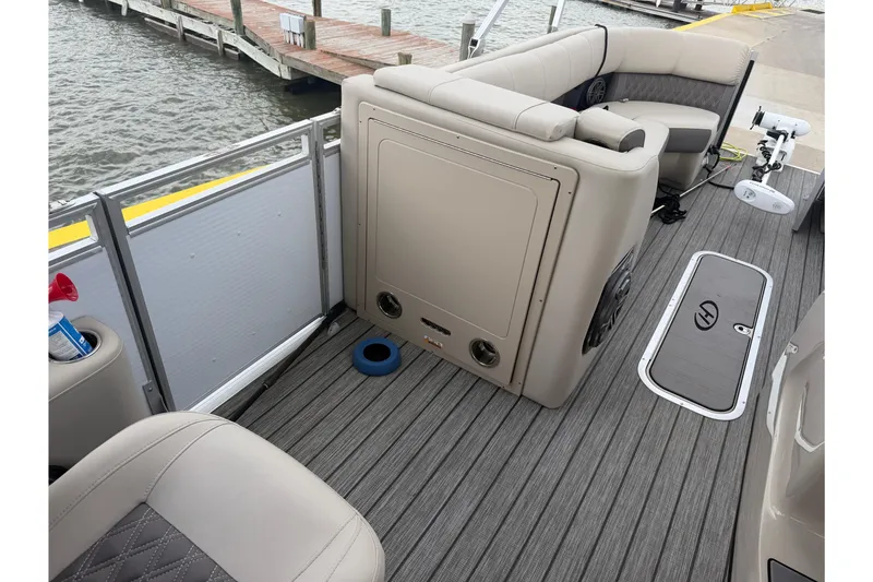 Slide: The Image of 2022 Harris FloteBote Solstice 250 interior with seating and deck details. - 15